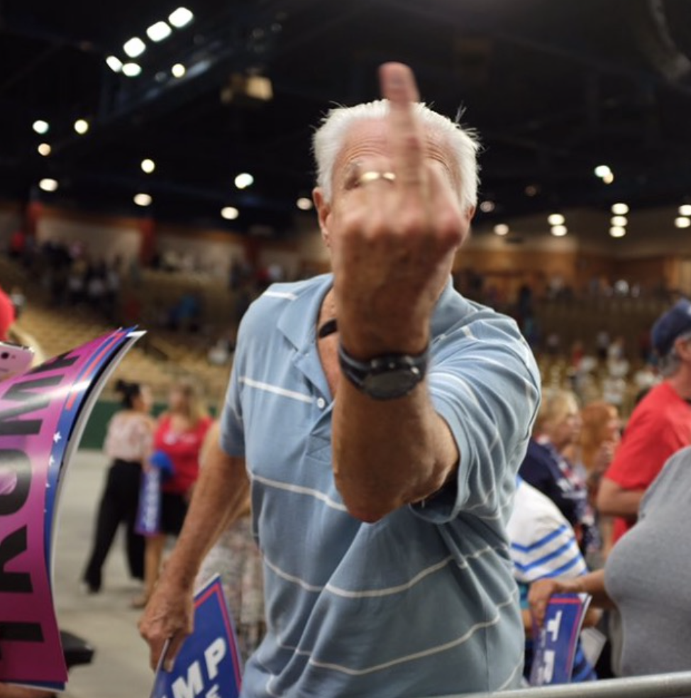 Trump Supporter Flips Off the Press 