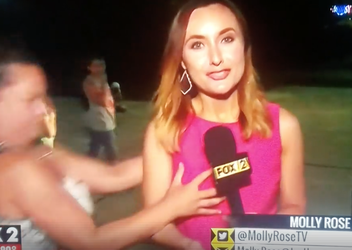 Reporter Has Boob Grabbed During Live Shot 