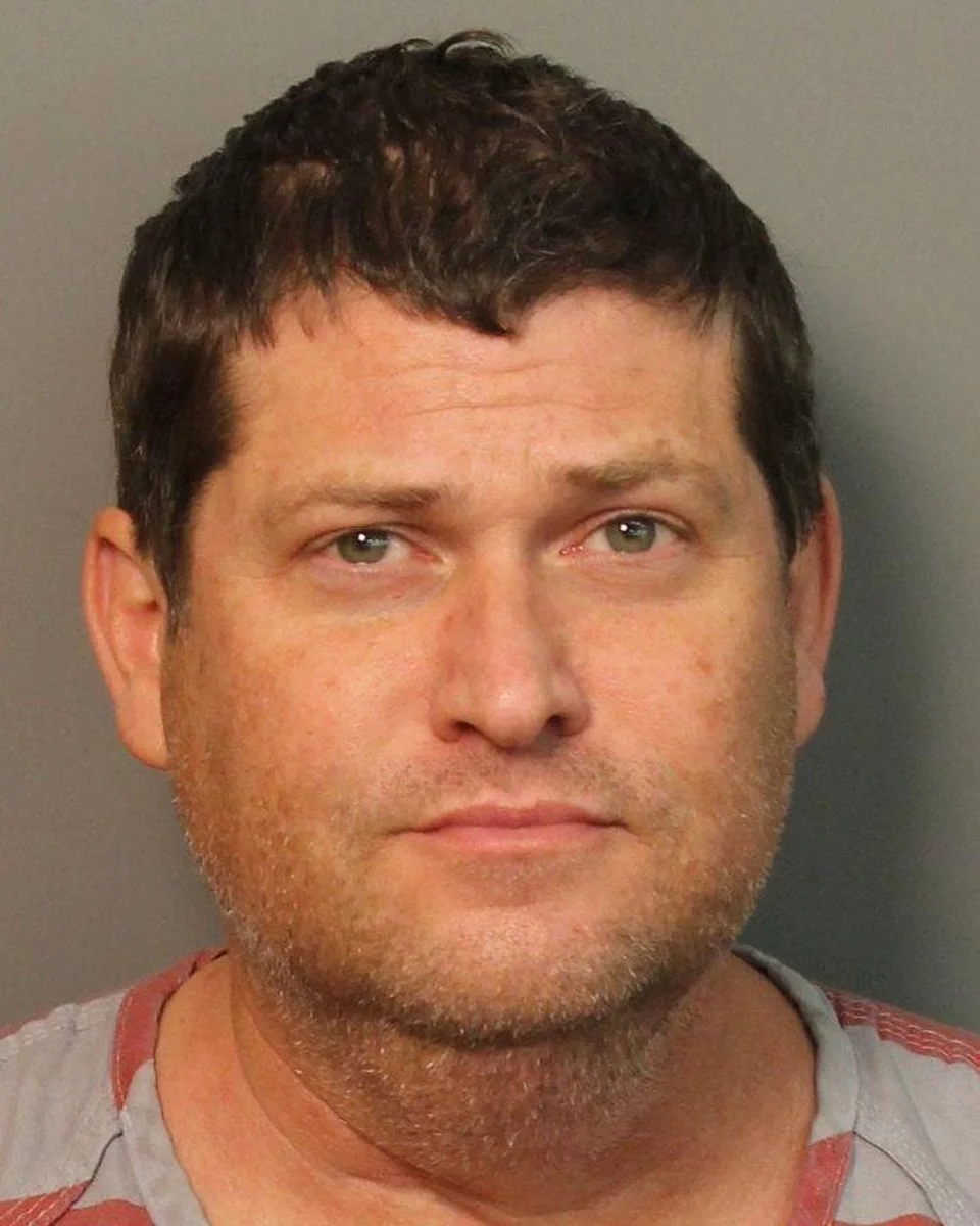 Cops Clamp the Cuffs on Weatherman 