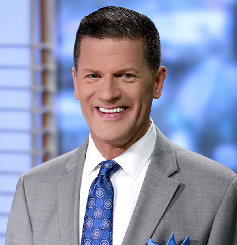 News Anchor Sues Town 