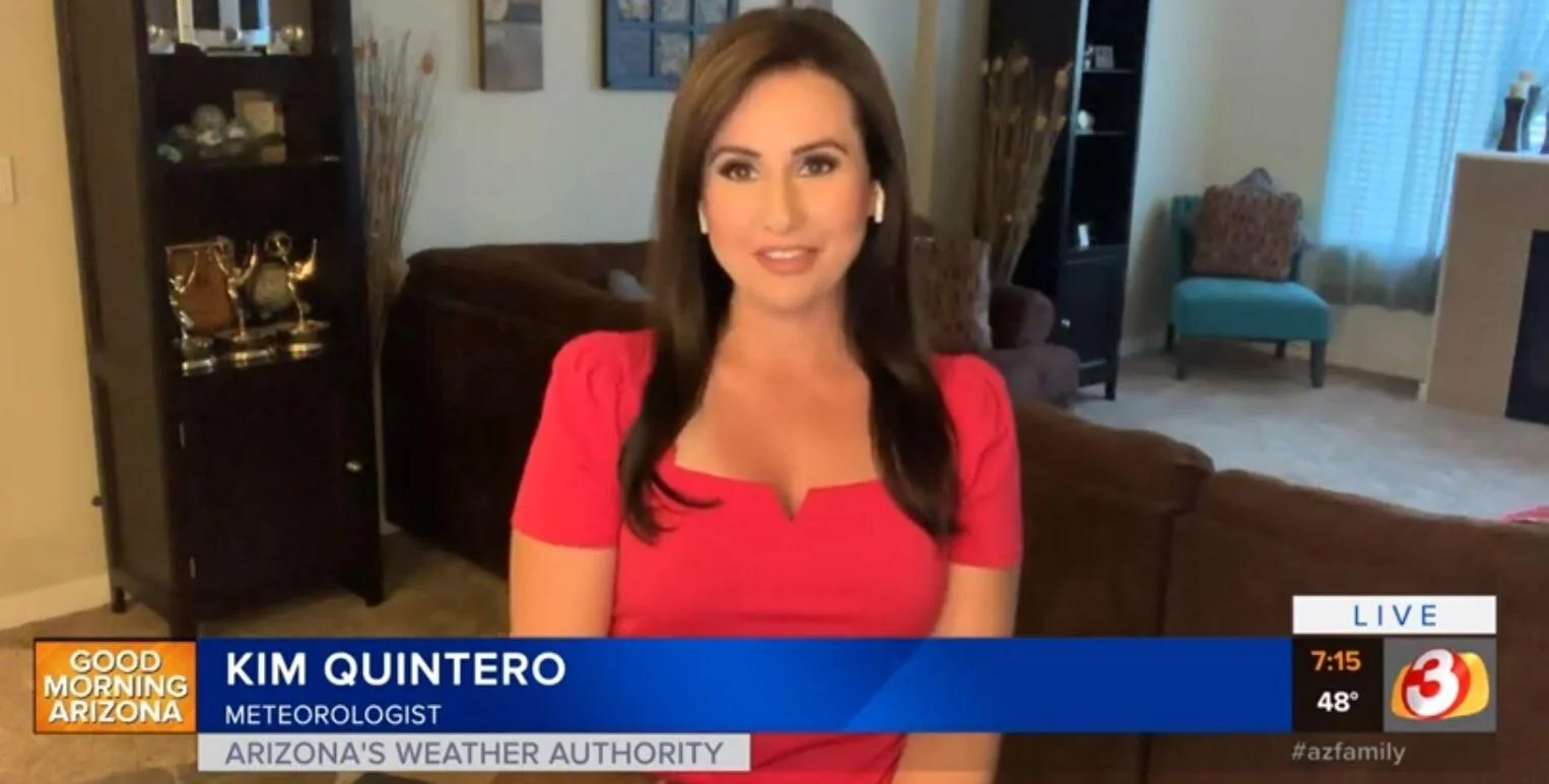 What Are Those Trophies Behind Her? 