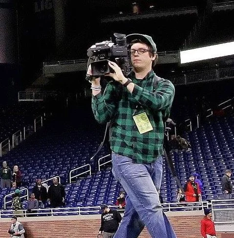 Photographer Leads a Hand 
