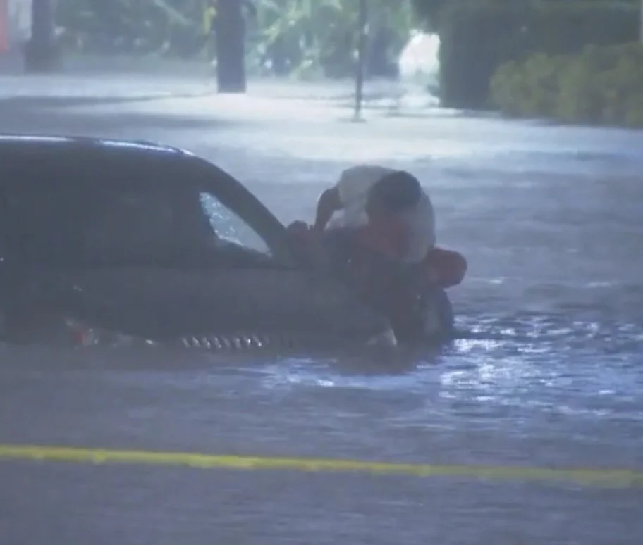 O-Town Reporter Helps Woman Stranded in Flood Waters