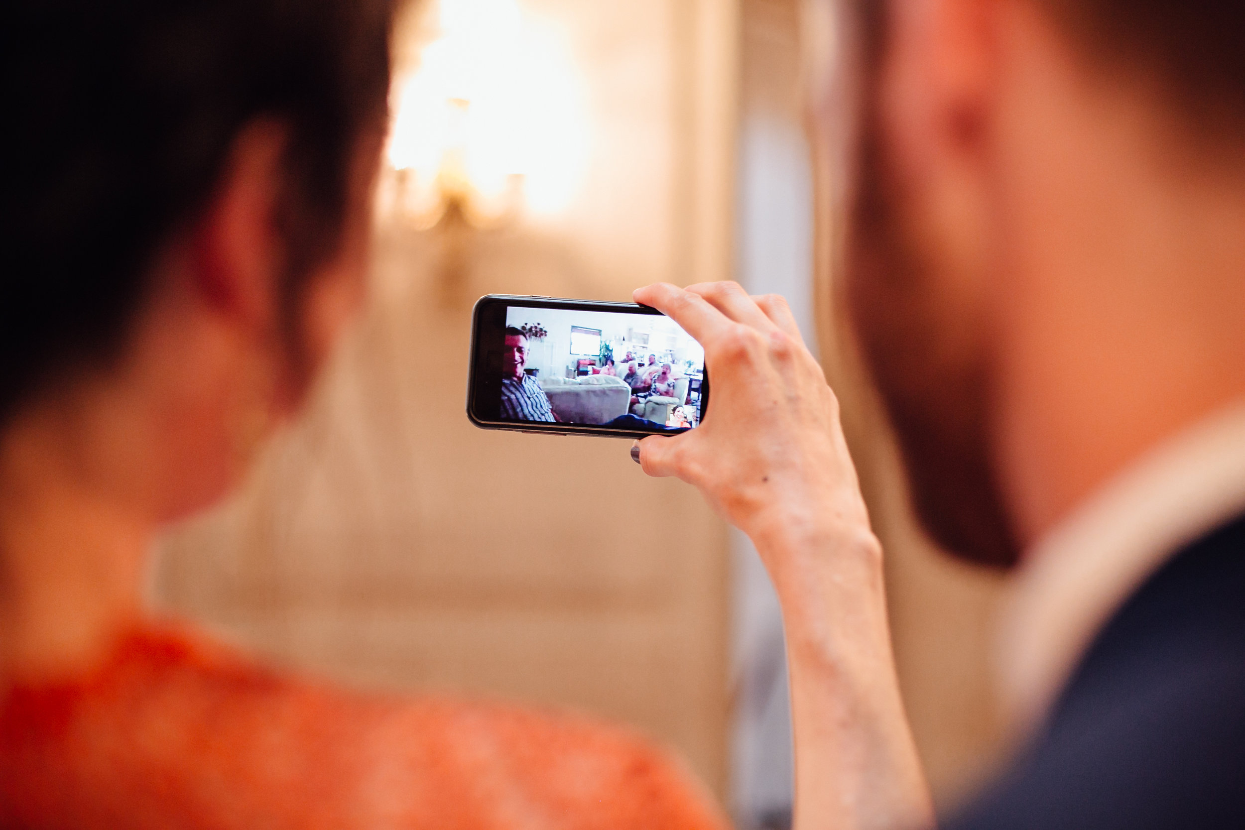  An intimate San Francisco City Hall ceremony, featuring an alternative bride in a bright orange dress. 