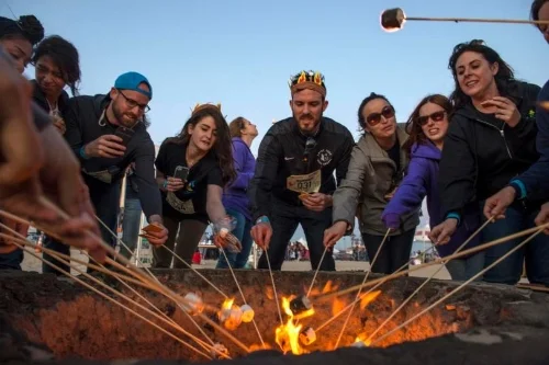 Toasting marshmallows with the neighbours is a great way to get to know each other.