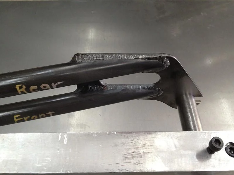 2012-07-24 03 streamliner fork welded, in fixture.jpg