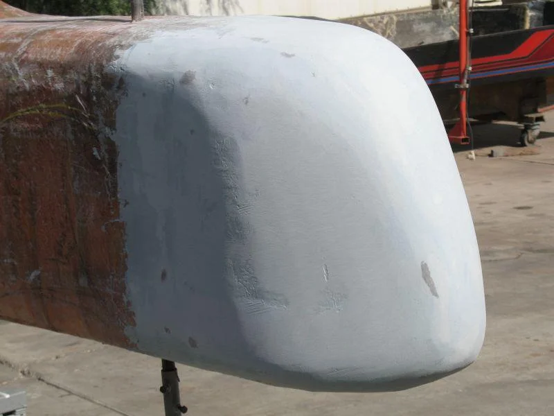2012-08-04 10 body tooling bondo on augmented nose.jpg