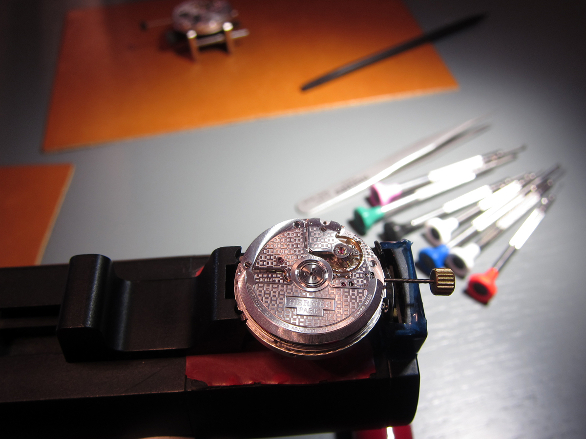 The tiny mechanism that makes up the inners of a watch.