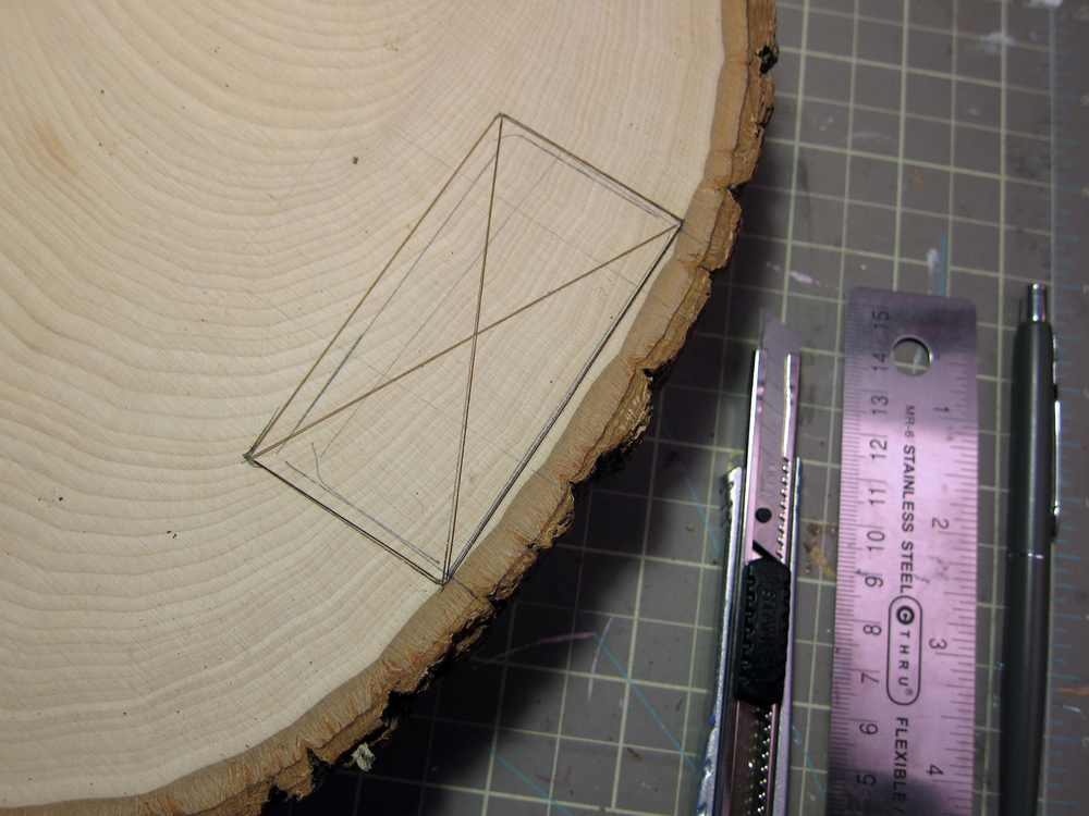  Make&nbsp;a chisel guide, slightly bigger than the tracing, using a utility knife and ruler.   