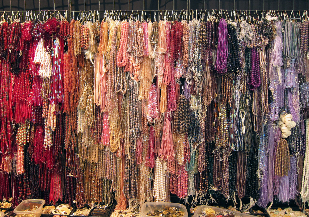  ​One vendor,  Sandy Schor , displayed vintage glass beads in a beautiful rainbow ombre. Red beads, pink beads, purple beads... 