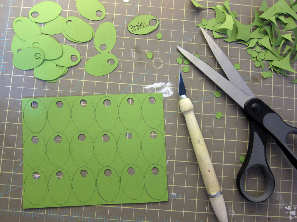  I created a template for the olives and traced around it multiple times onto green paper so I could cut out all of them at once. 