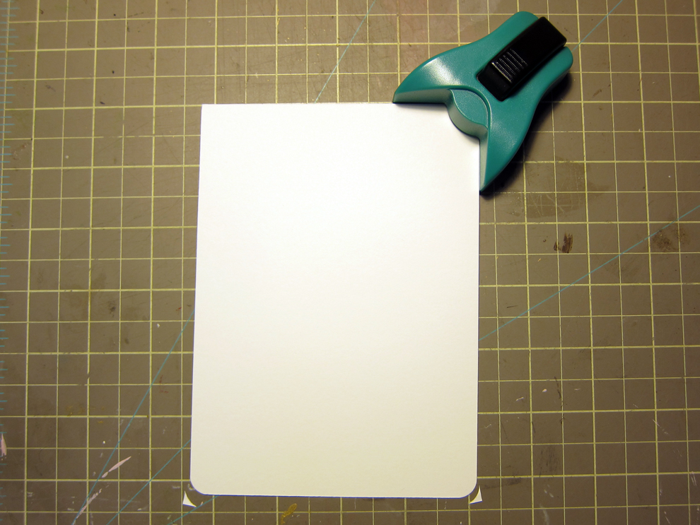  I precut card-stock to fit my envelopes and rounded the corners with a craft punch. 