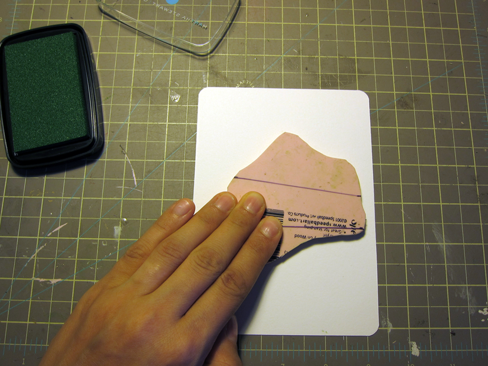  ...then flipped it over, carefully centering the block on the card-stock, and pressed down on the back with my fingertips. 
