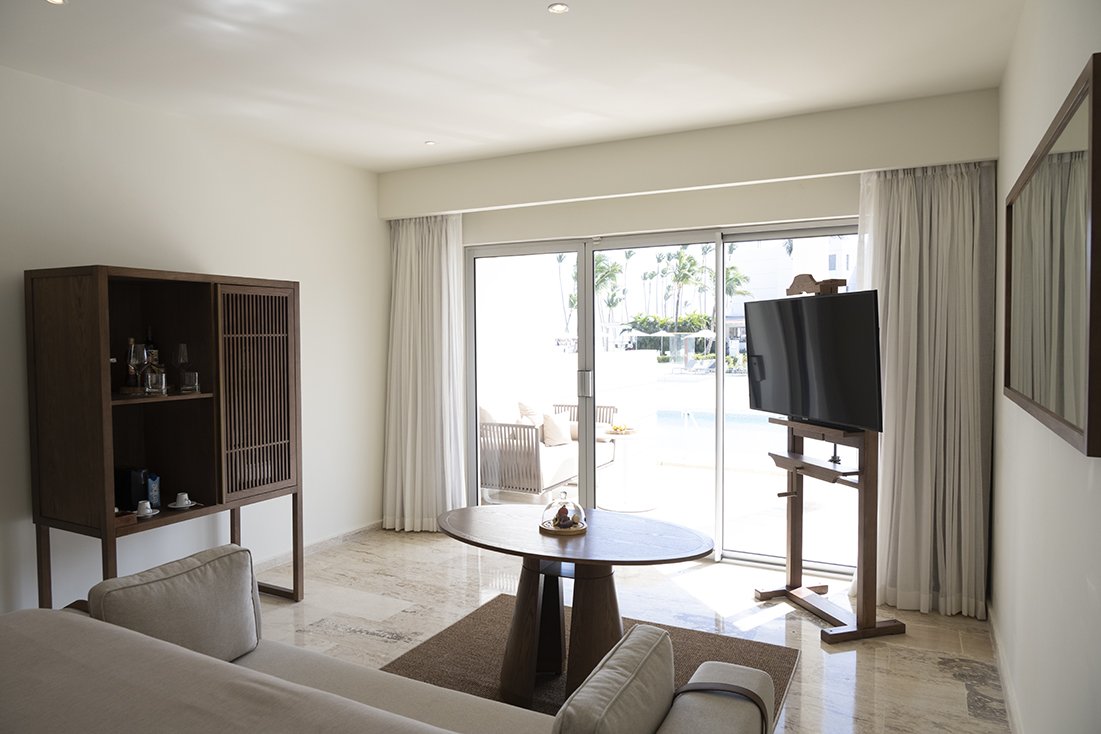 This is an image of a Melia Punta Cana hotel room but only with natural light. It has the exterior of the image completely blown out. This is the before image.