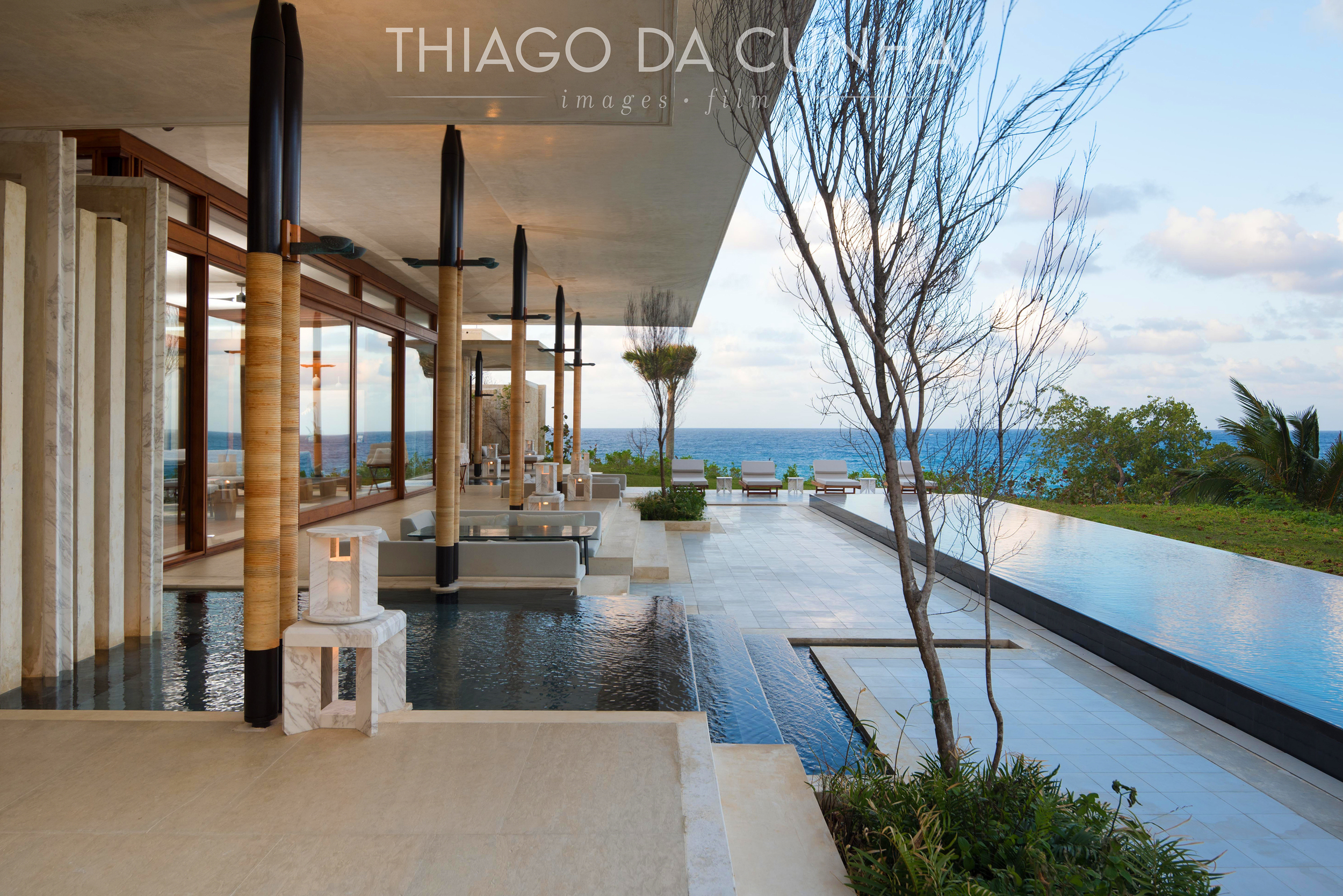 This view from the side shows how close the property is to the ocean. I tried to find an angle to show how much surrounding water the villa has. The Aman photography guidelines states that the water is important. Calmness, serenity and a sense of relaxations is what I felt and tried to transmit it in this image. 