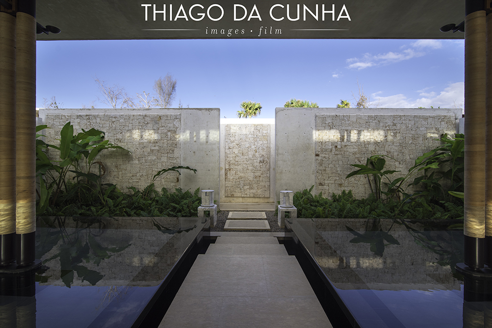 This image is the entrance to the villa from the owner's door. As you see, water is present on both sides as the guest walk into the property. This images on the bottom is the same space looking at the villa from the entrance. Again, water in the front, then the pool and later the ocean. 