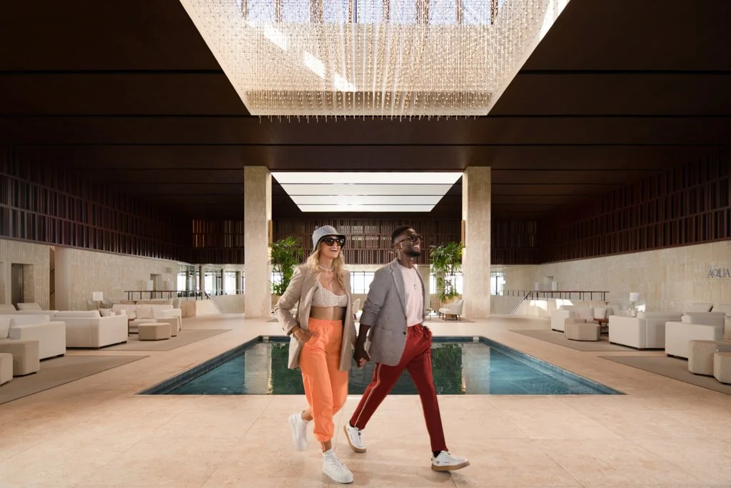 Live Aqua Beach Resort Punta Cana lobby area with 2 guests walking by Dominican Republic architectural hotel photographer thiago da cunha.jpg