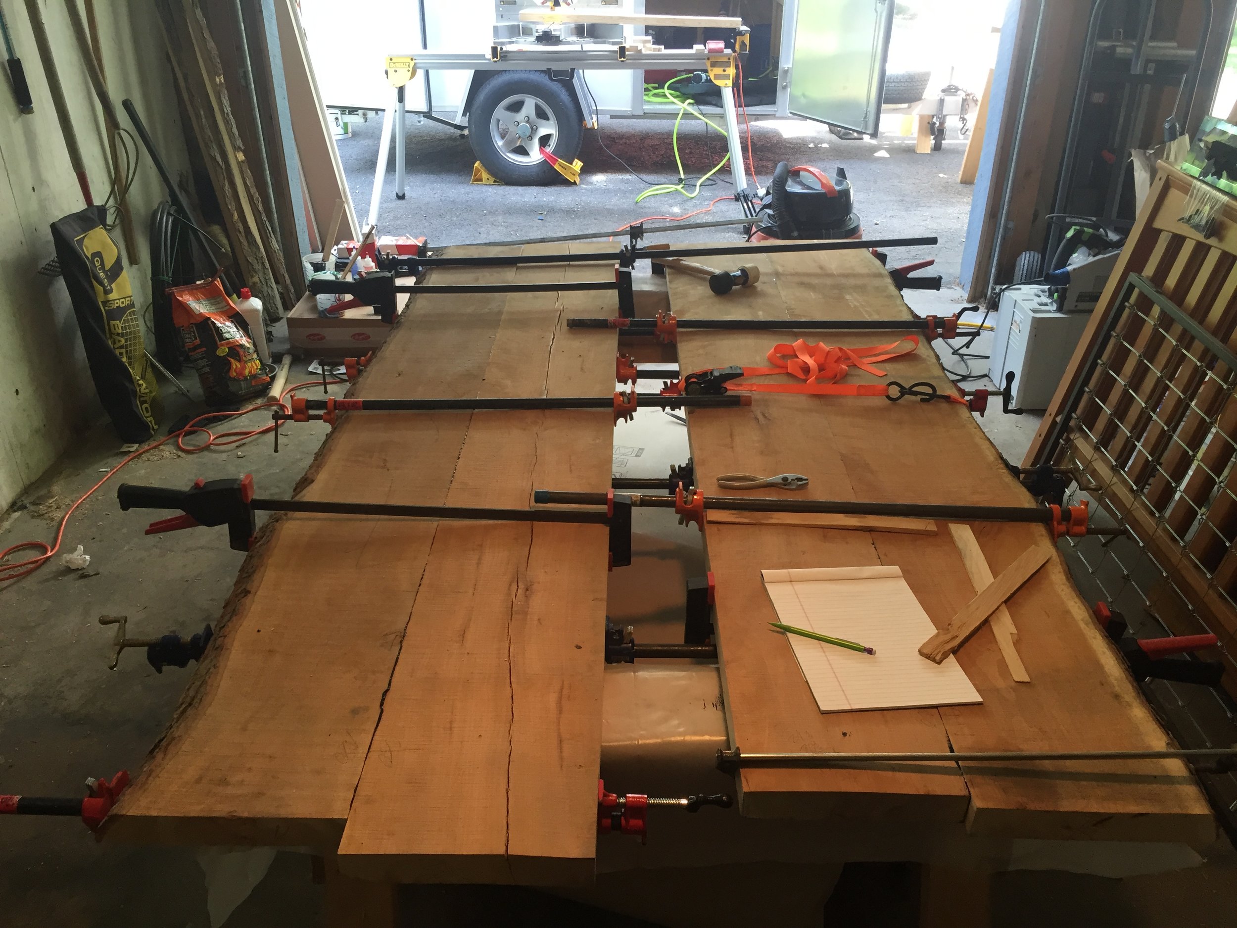  Once selected, the team shaped and glued up the slabs into the bar countertop. 