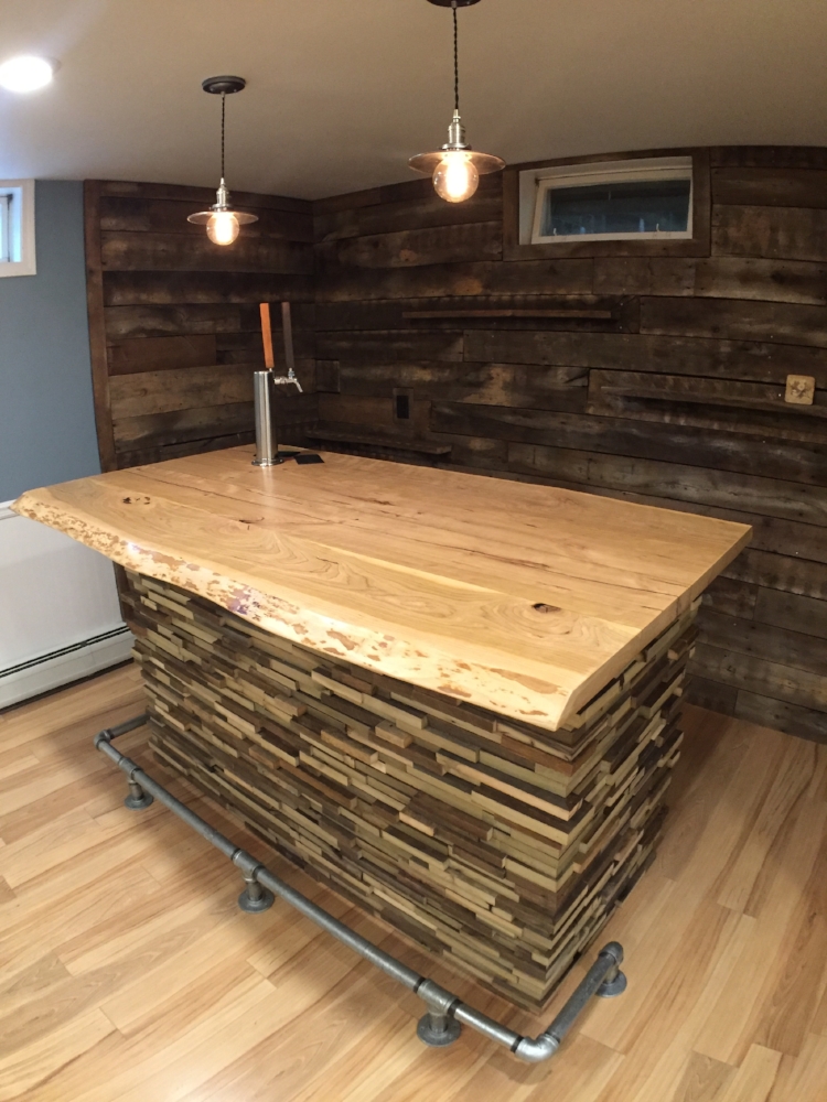  The highlight of this complete basement remodel was the addition of a custom designed bar built from hand-selected barnwood and hardwood slabs.&nbsp; 