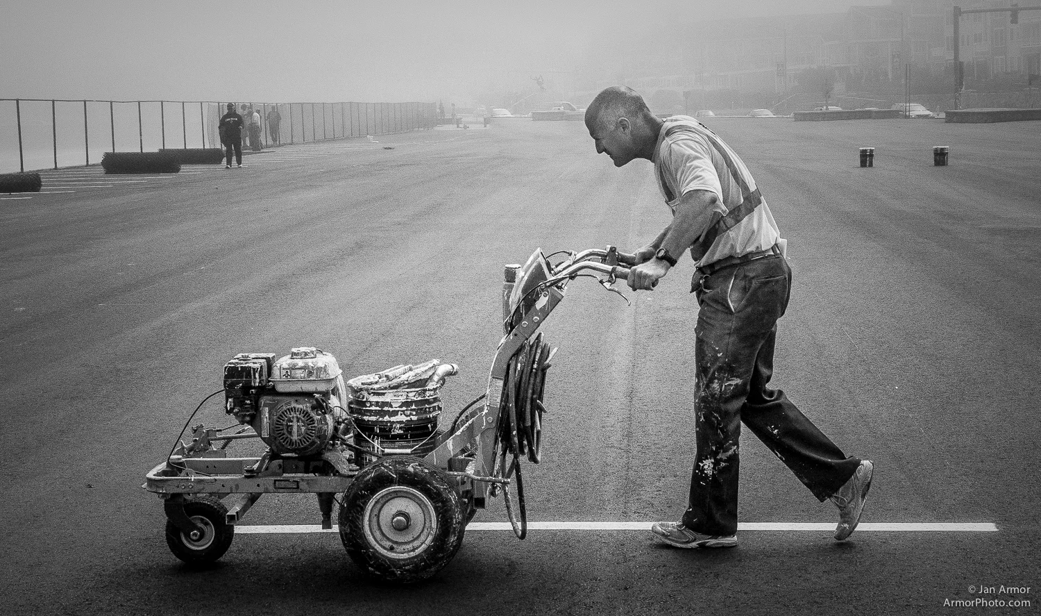 The striper, i.e the man who paints the lines in the parking lot.