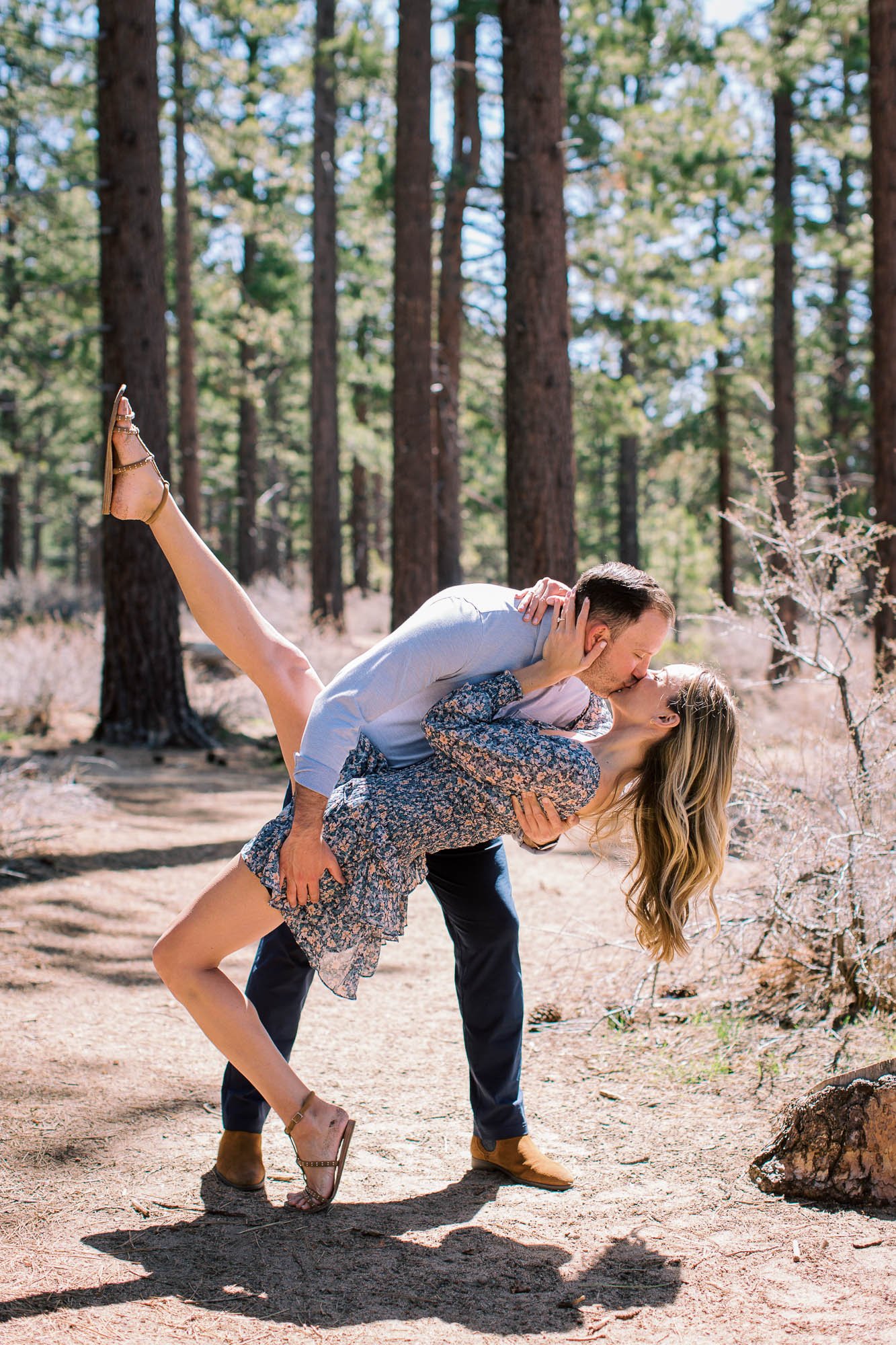 dramatic dip in forest engaged couple