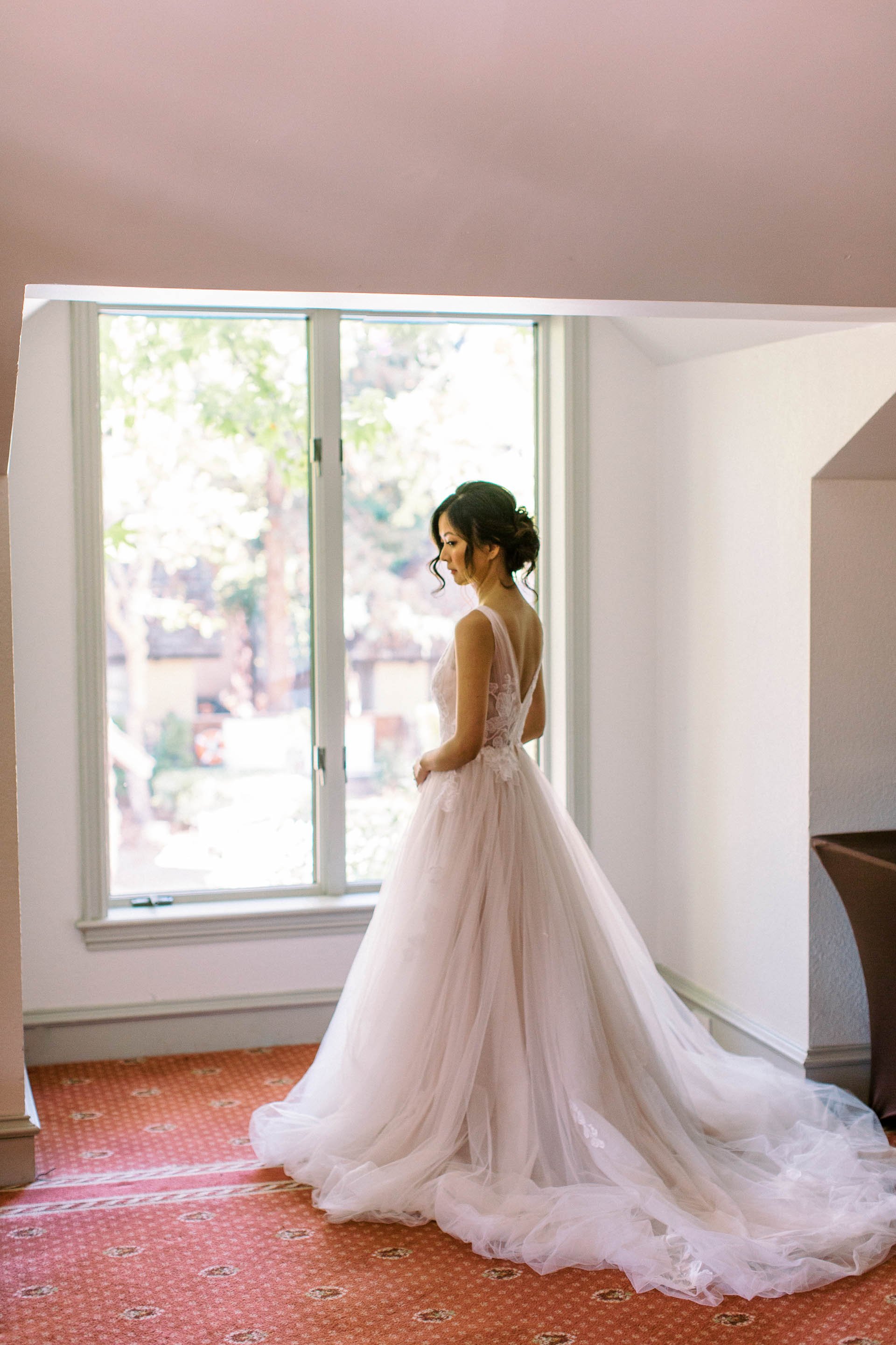 bridal portrait in front of window