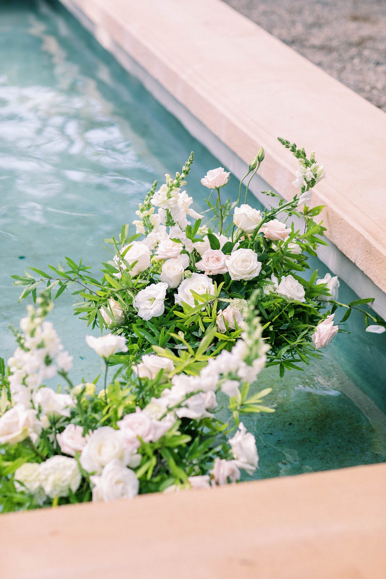 beaulieu garden floating flowers in pool