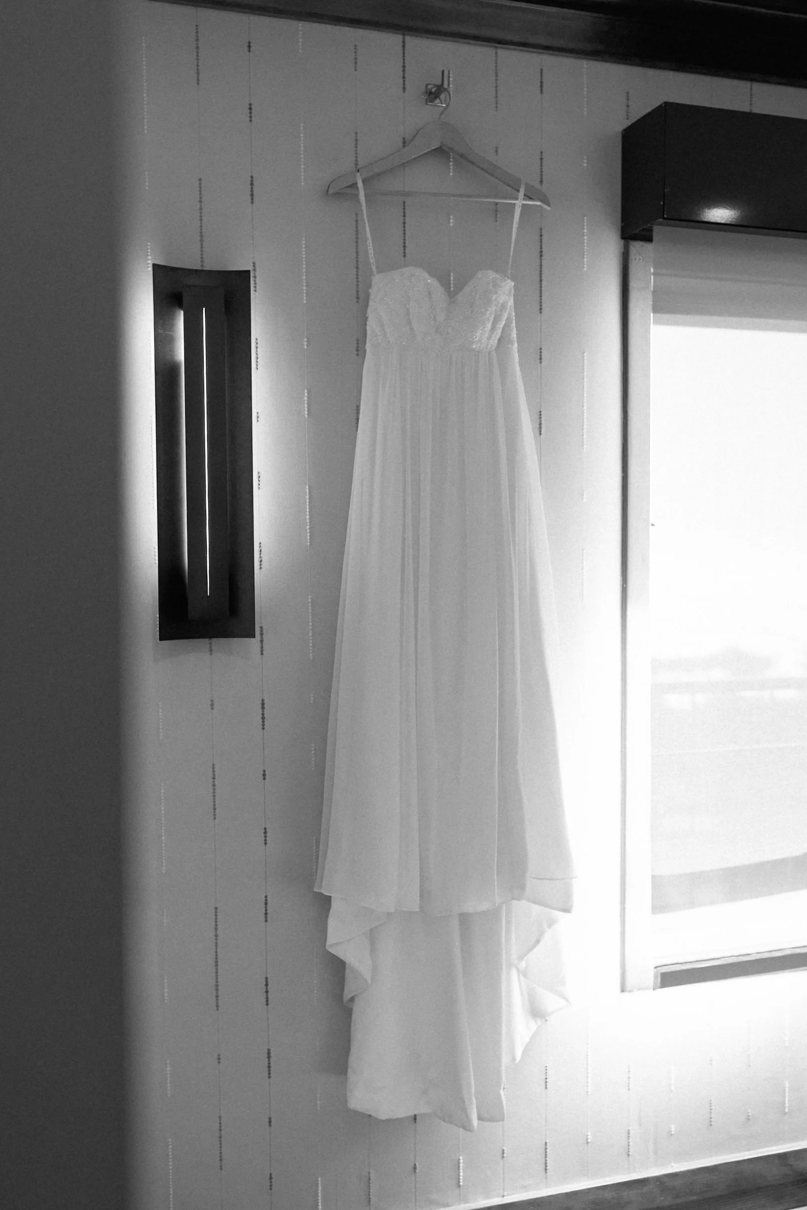 wedding dress hanging at hyatt carmel highlands
