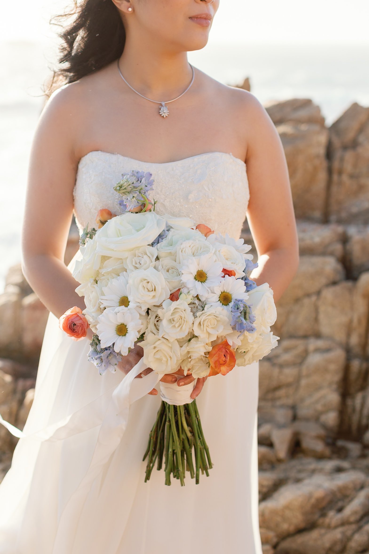 bride with bouquet at big sur 