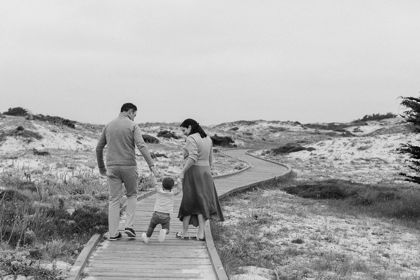 family walking on asilomar boardwalk 