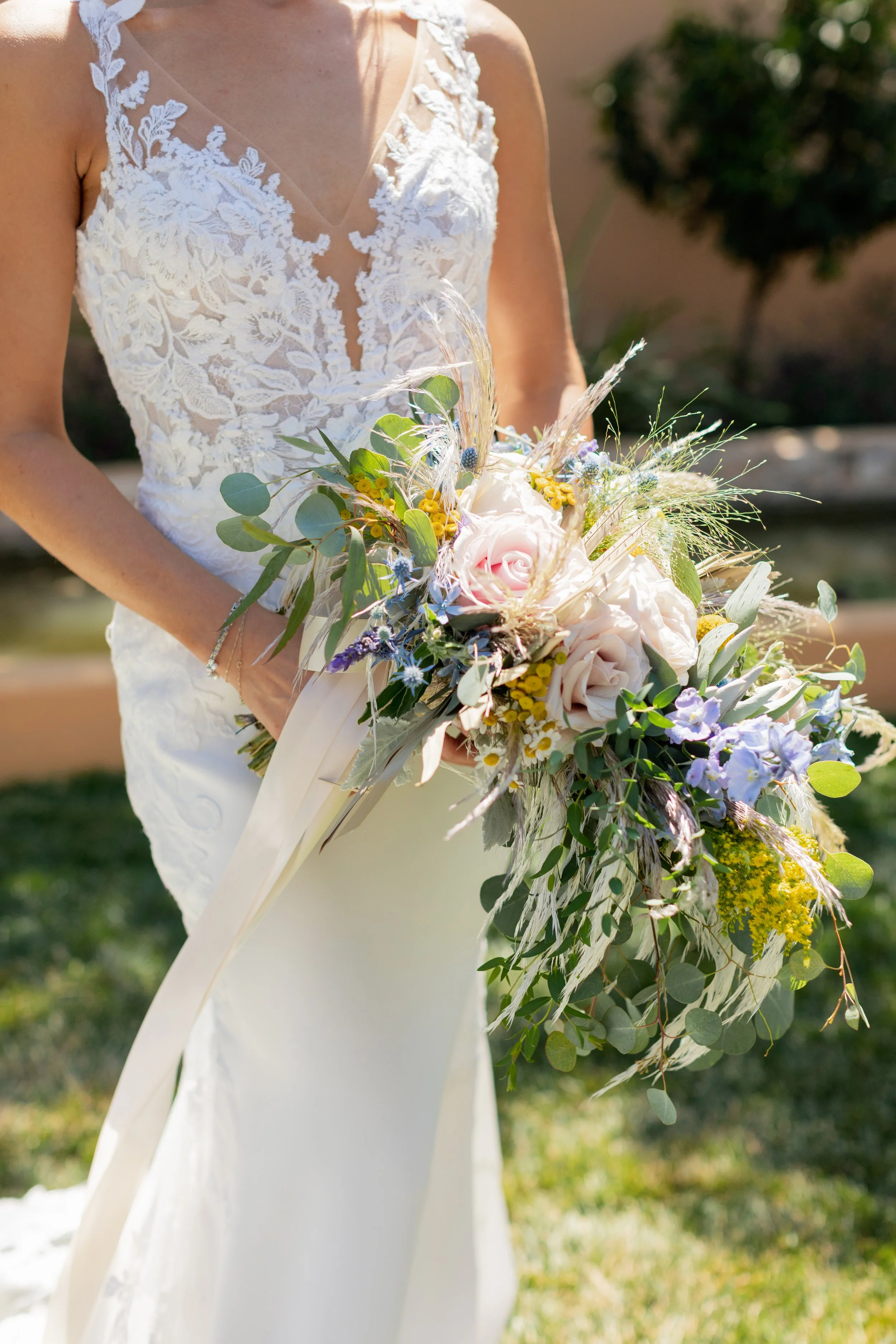 bride holding bouquet at carmel valley wedding