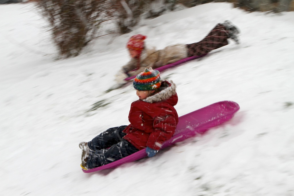 Sledding at Lee Street Park