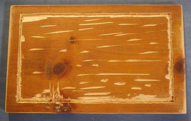 Hand-routed board. I only cut myself once.