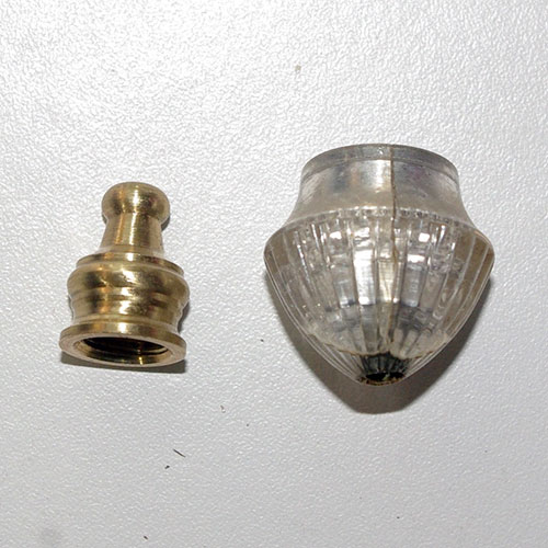 The original finial and the brass finial used for the center.