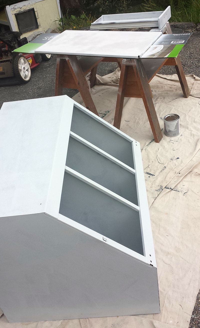Upper corner cabinet and door primed and ready to paint.