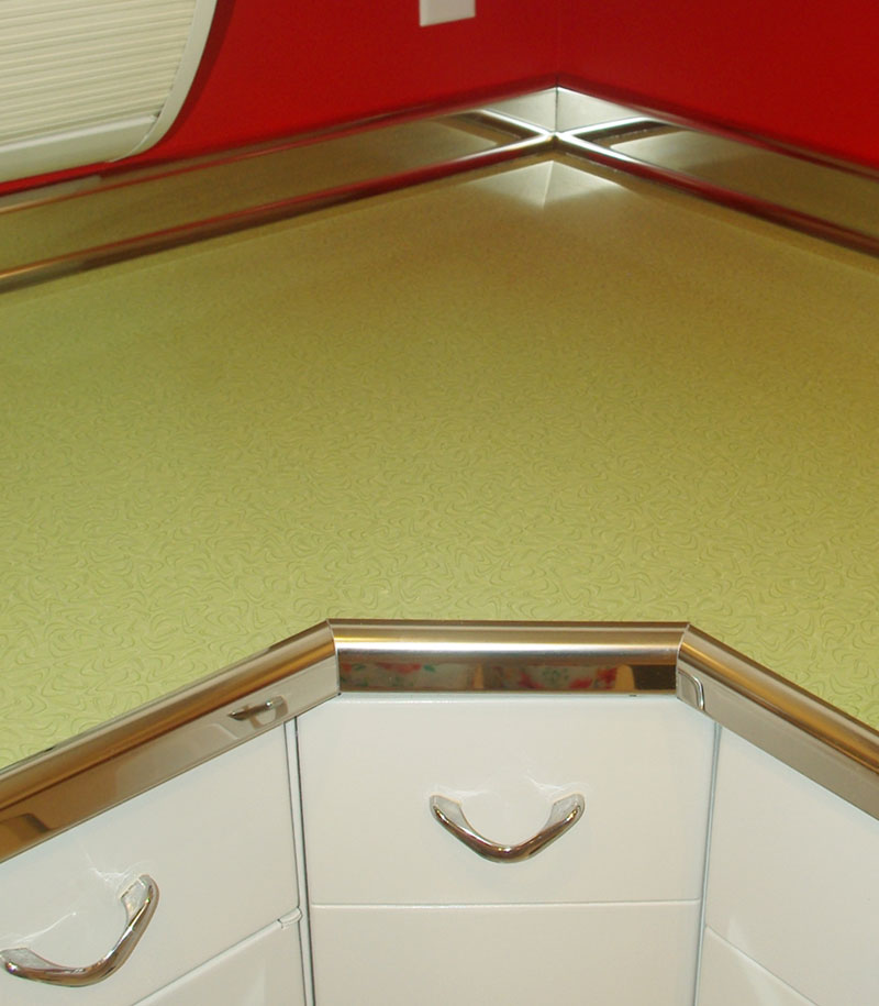 Same corner, but with new laminate and new metal edging.