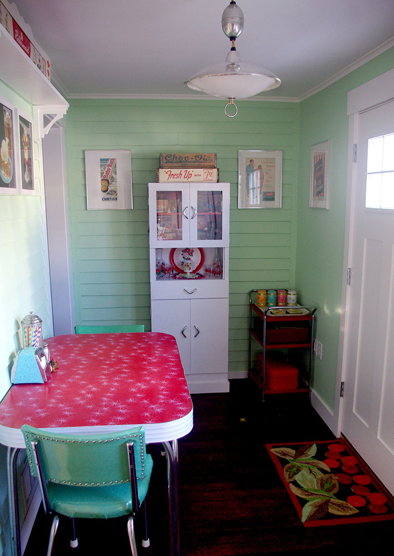 Finished porch, with newly hung artwork