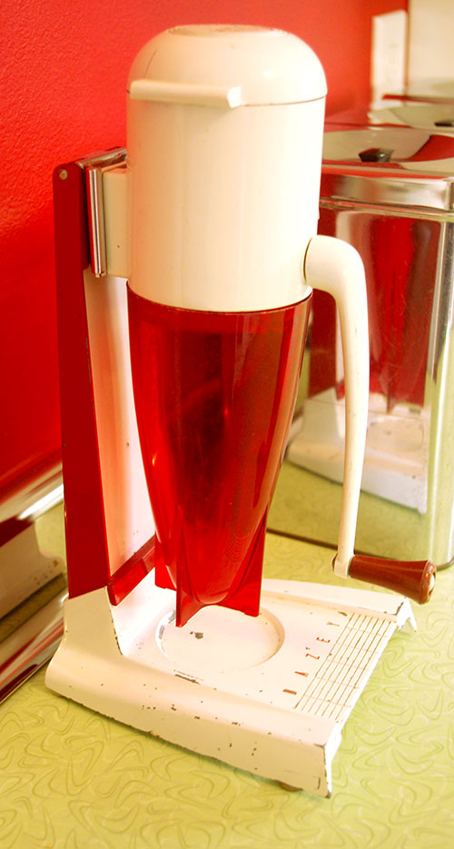 This Dazey ice crusher is exactly like the one we had when I was a kid. I love the rocket-shaped design of these