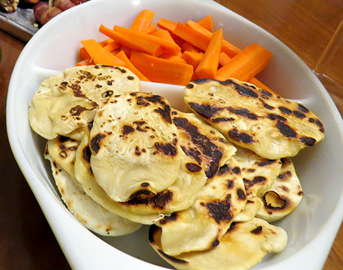 Homemade flatbread and carrot sticks for dipping.