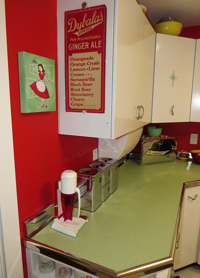 Our kitchen with the newly painted artwork in place.