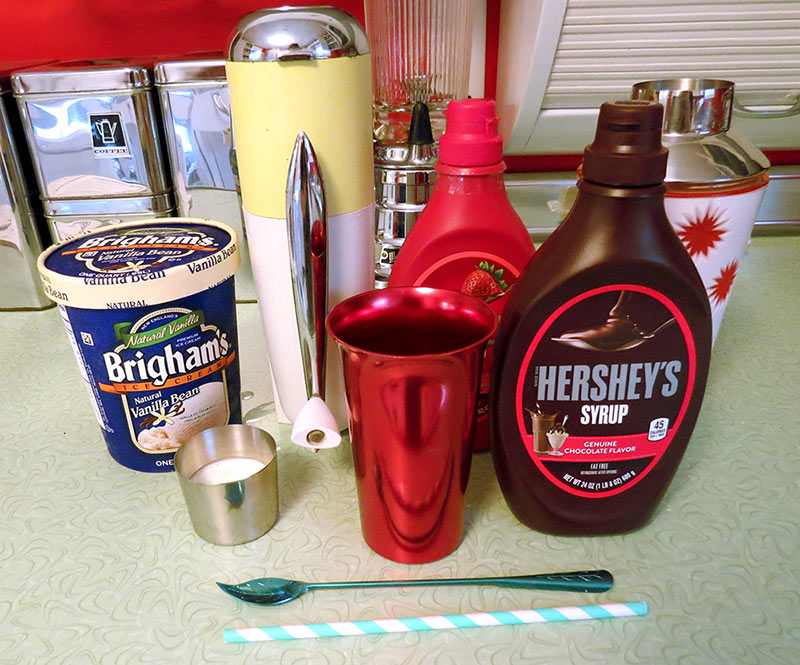 The ingredients for "Cream City", aka chocolate/strawberry soda.