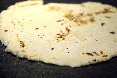 Frying a tortilla on the pan