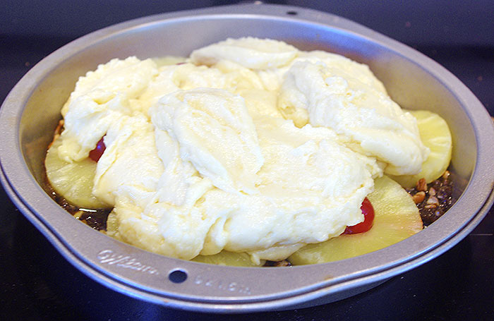 The cake batter added on top.