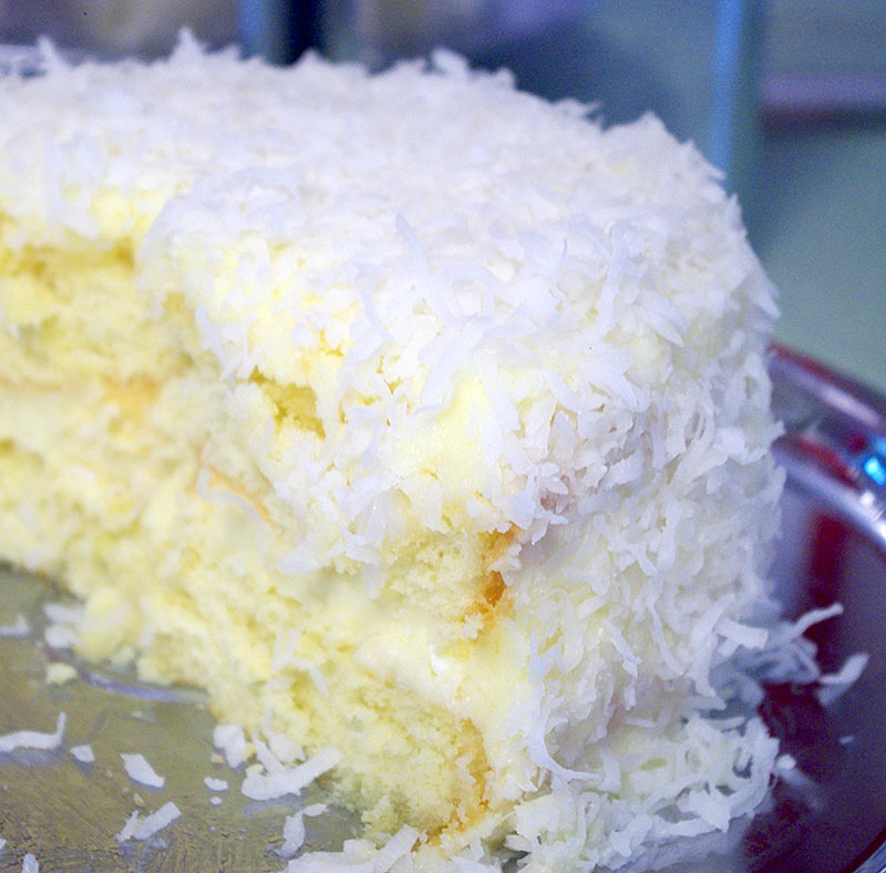 A close-up of fluffy coconut cake