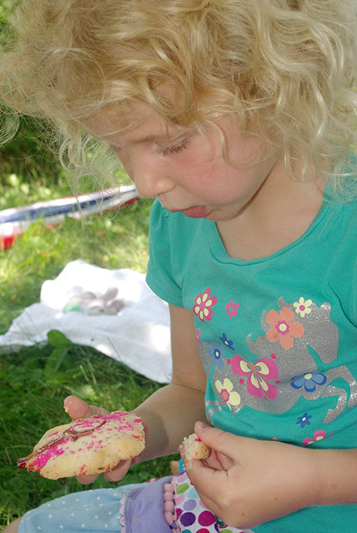 Julia testing her tartlet. She only ate the parts with jam on them, as the crust wasn't very sweet.