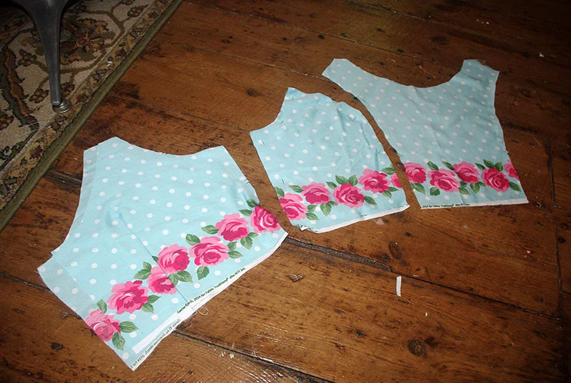 The bodice pieces lined up on the smaller border print.