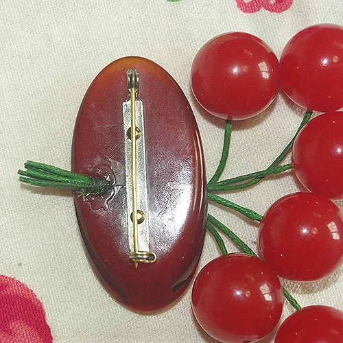 The back of the newly repaired brooch