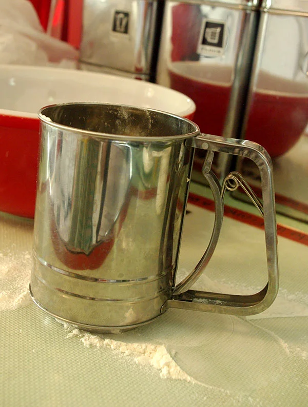 My flour sifter, which I avoid using as much as possible because it is such a pain to clean.