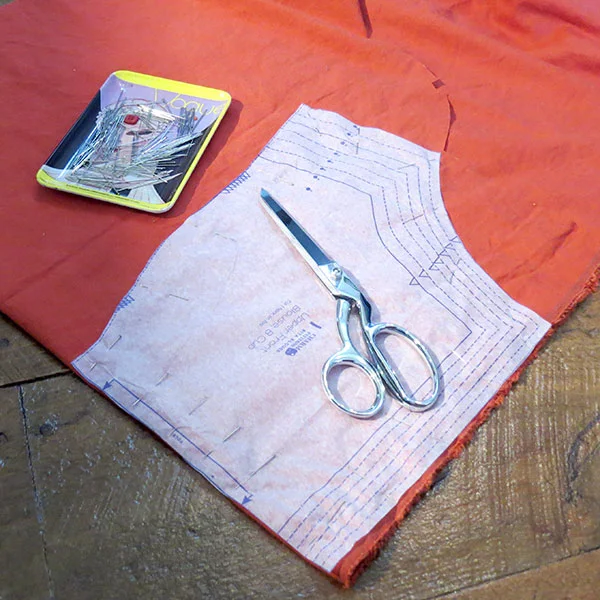 Cutting out the pieces.