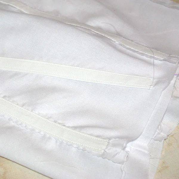 Boning casing in place in the lining
